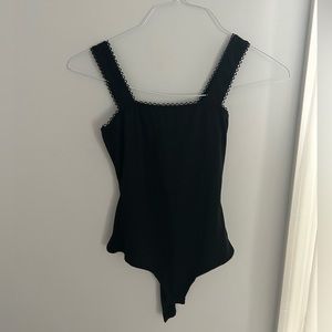 Black ribbed Bodysuit with detailing on top size XS